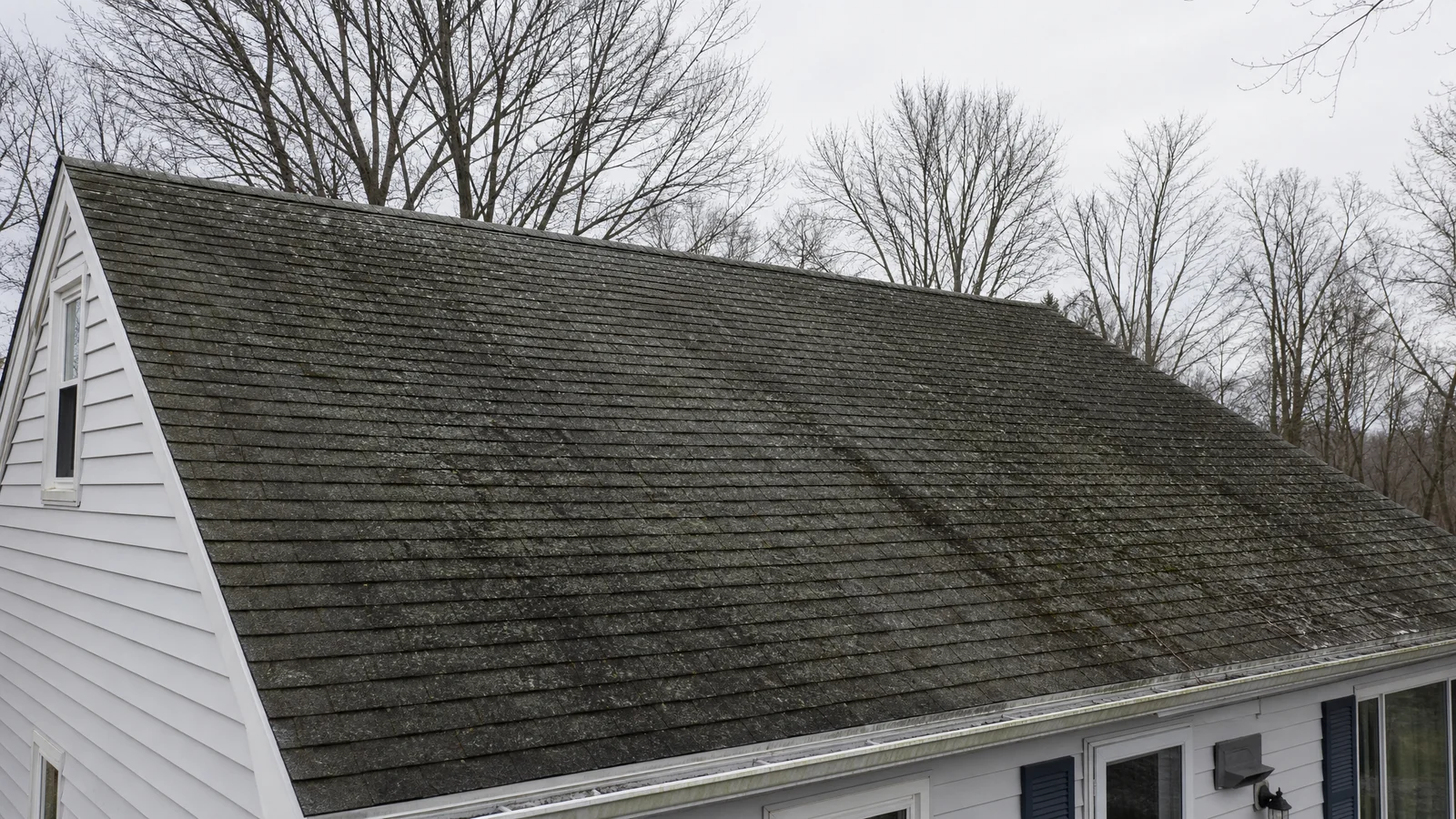 Aging asphalt roof on a Connecticut home